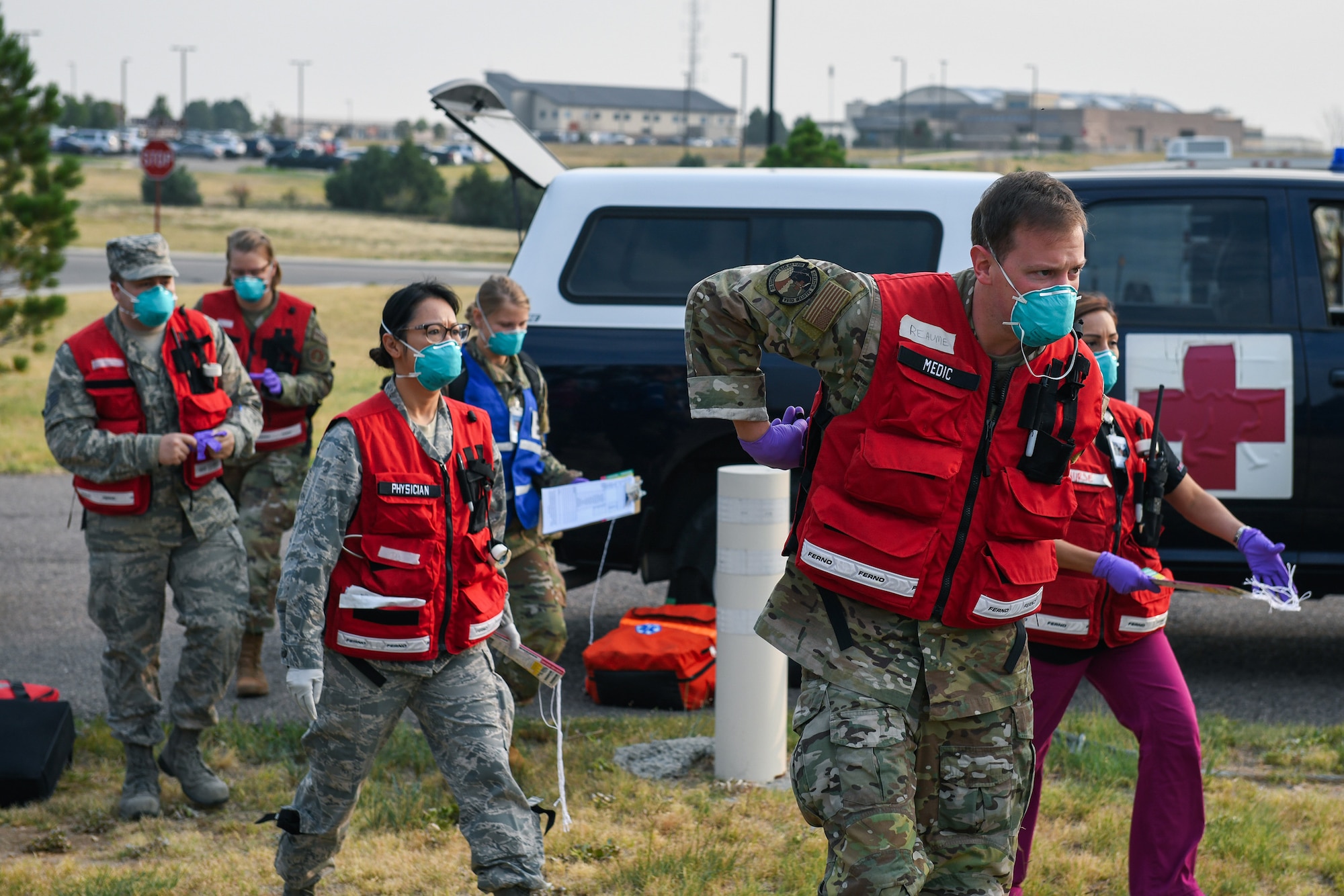Airmen from the 460th Medical Group arrive on scene during the Ready Eagle exercise where a simulated explosion occurred Sept. 18, 2020, at the Air Reserve Personnel Center on Buckley Air Force Base, Colo.