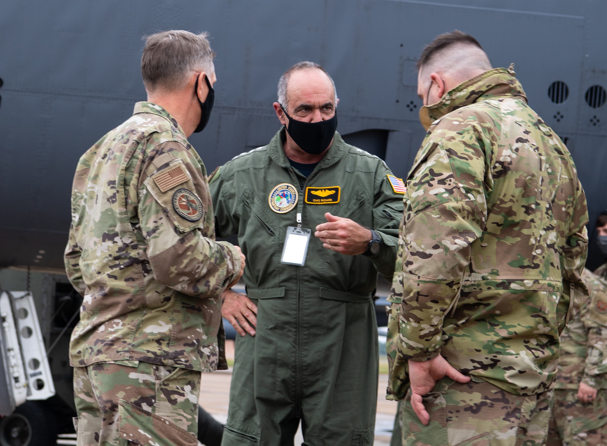 Adm. Charles A. Richard, center, U.S. Strategic Command commander, talks with Gen. Timothy M. Ray, left, Air Force Global Strike Command commander, and Col. Mark C. Dmytryszyn, right, 2nd Bomb Wing commander, during Richard's visit to Barksdale Air Force Base, La., Sept. 21, 2020. Richard visited various units around Barksdale to see how the 2nd Bomb Wing, Air Force Global Strike Command and 8th Air Force fit into the USSTRATCOM mission of deterring strategic attack and employing forces, as directed, to guarantee the security of the nation and its allies. (U.S. Air Force photo by Airman 1st Class Jacob B. Wrightsman)