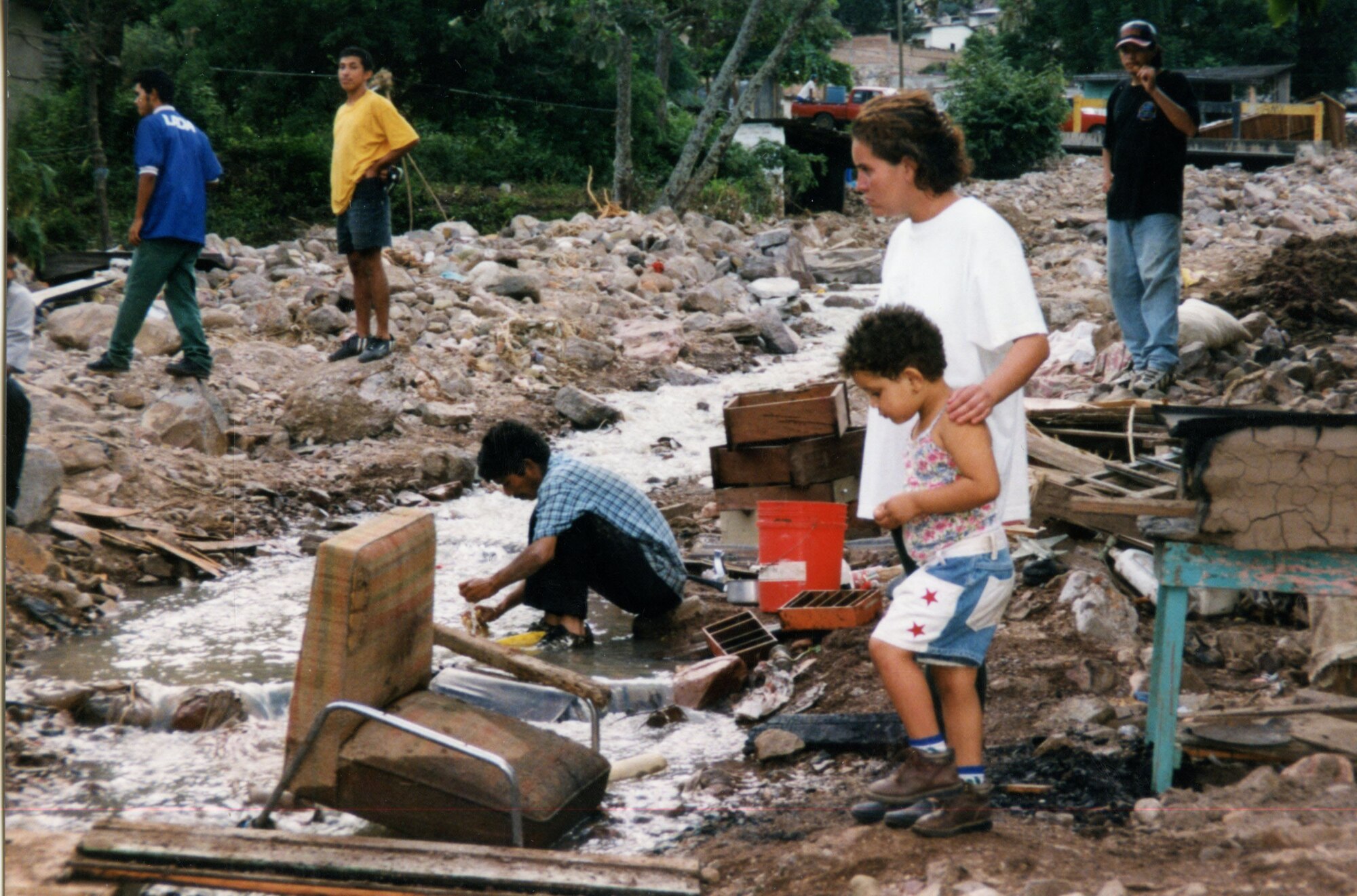 kids playing in stream