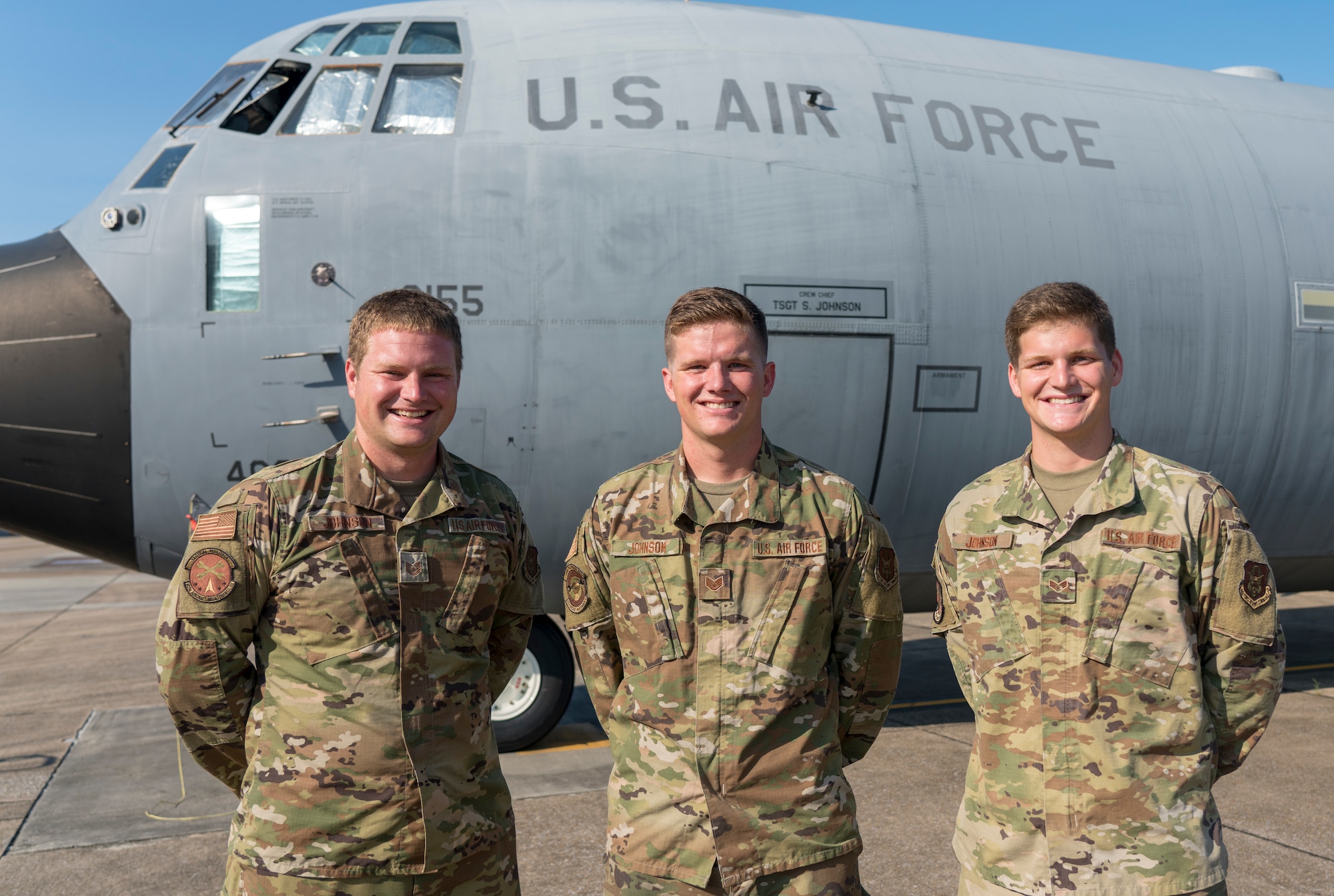 Tech Sgt. Seth, Staff Sgt. Paul, and Senior Airman Mark Johnson, all crew chiefs in the 403rd Wing at Keesler Air Force Base, Miss., pause from their workday for a photo in front of Seth's C-130J Super Hercules Sept. 9, 2020. The three Air Reserve Technicians are brothers from Bay St. Louis who serve in the three different maintenance squadrons servicing the 815th Airlift Squadron's C-130J "Flying Jennies" and the 53rd Weather Reconnaissance Squadron's "Hurricane Hunters." (U.S. Air Force photo by Senior Airman Kristen Pittman)