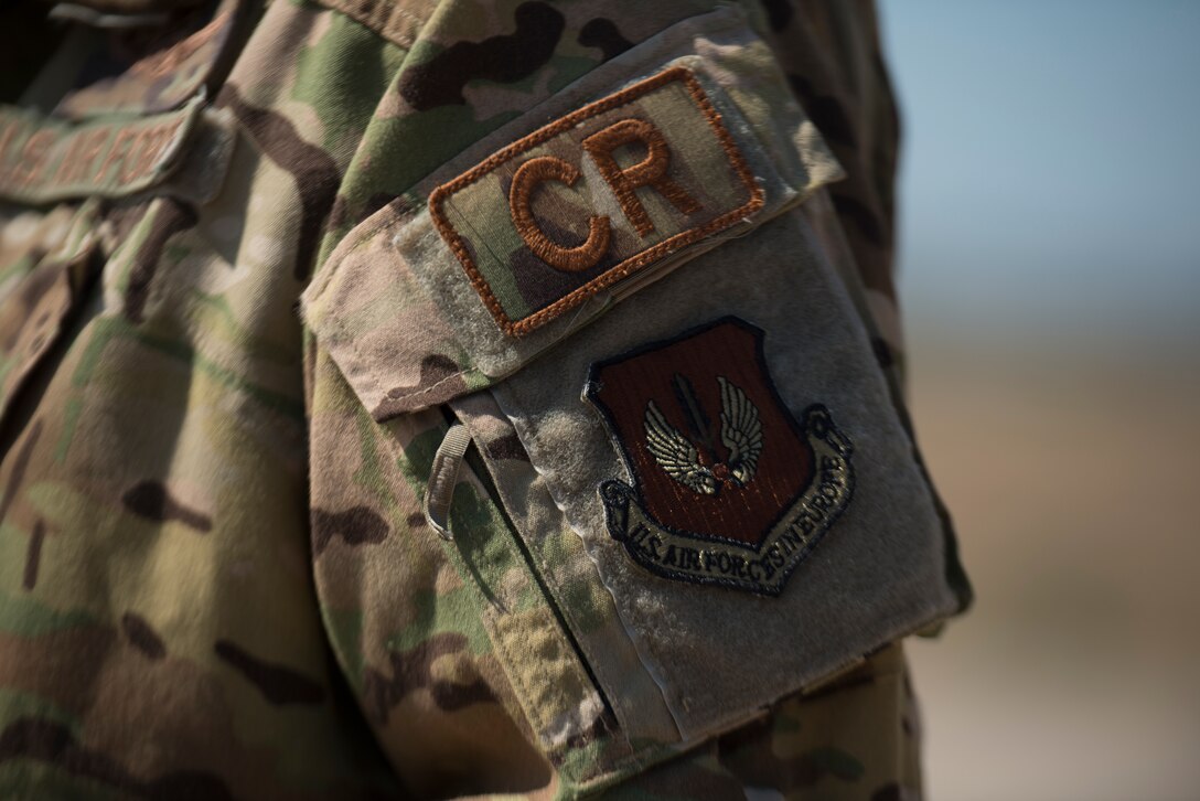 An Airman displays his patch.