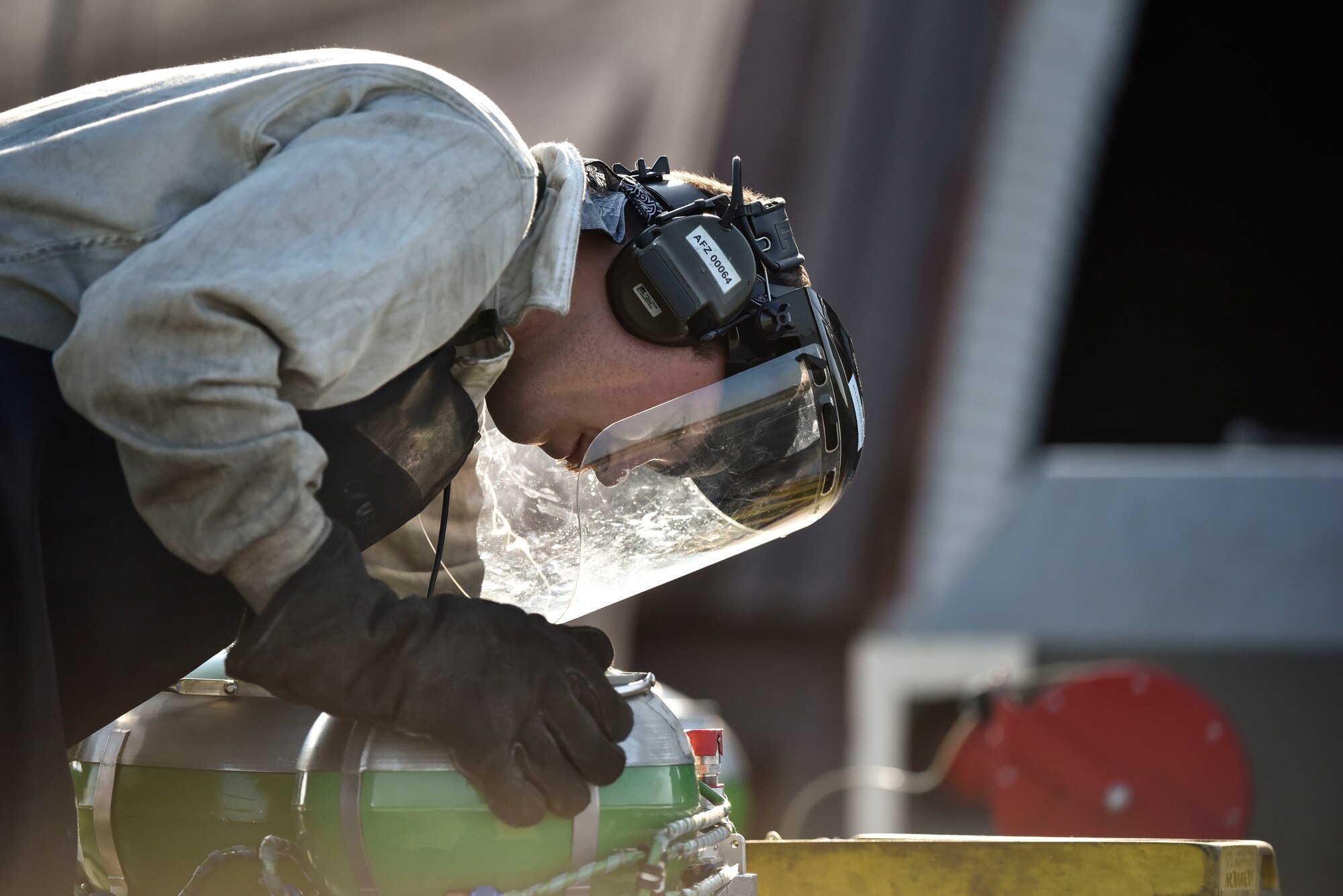 A photo of Airman securing liquid oxygen.