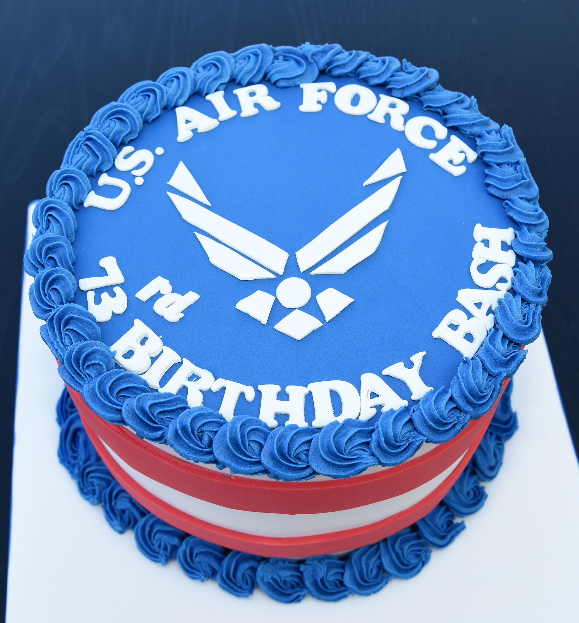 A cake celebrating the 73rd birthday of the U.S. Air Force is set for display at Royal Air Force Mildenhall, England, Sept. 18, 2020. The cutting of a cake using a sword is a military tradition, usually performed at the Air Force Ball by both the 100th Air Refueling Wing commander and the youngest Airman in attendance. (U.S. Air Force photo by Karen Abeyasekere)