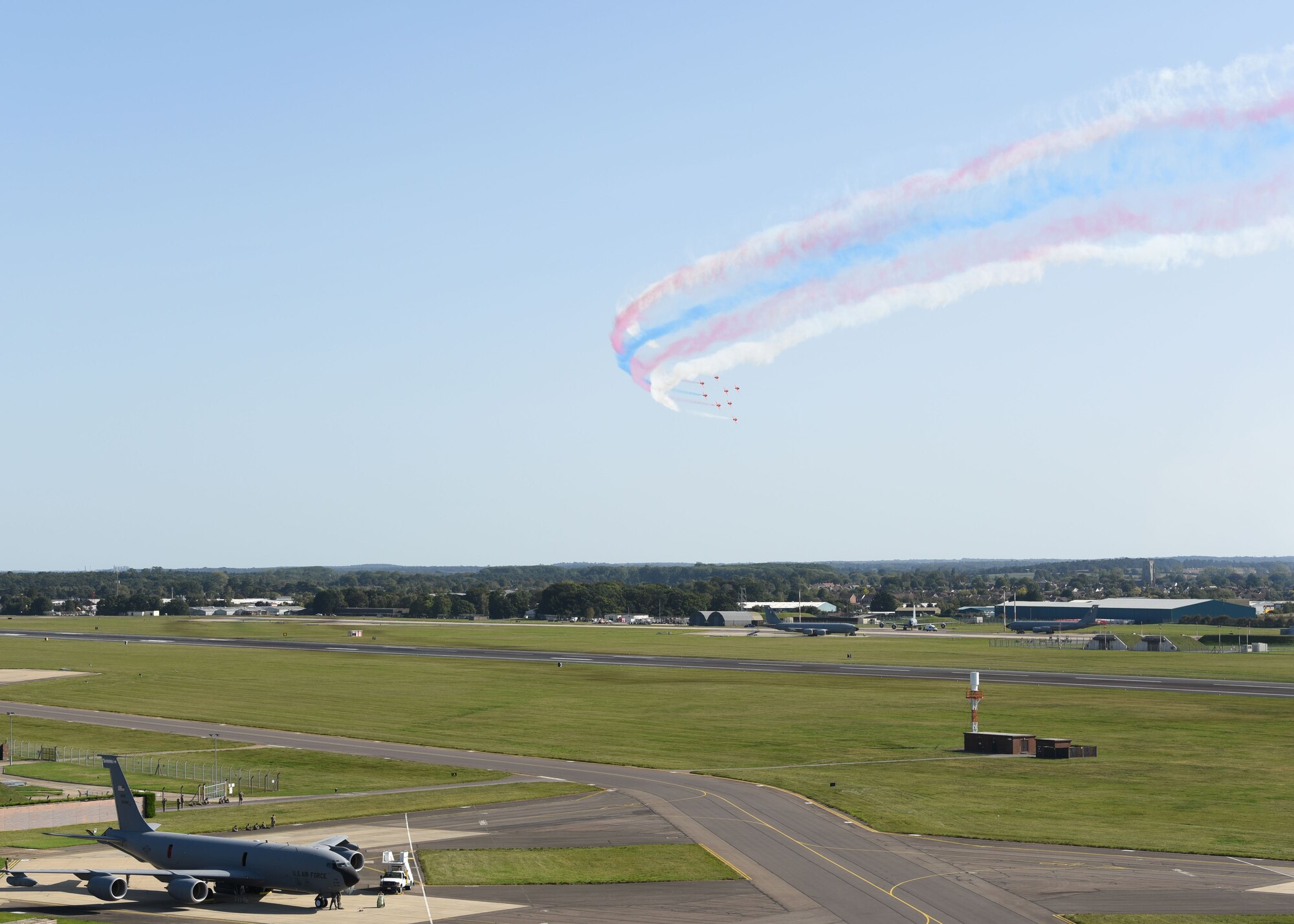 The Royal Air Force Aerobatic Team, known as the Red Arrows, performs a fly over as part of the U.S. Air Force's 73rd birthday and 80th anniversary of the Battle of Britain at RAF Mildenhall, England, Sept. 18, 2020. The celebration included the participation of U.S. Air Force F-15C Eagles, a CV-22B Osprey, MC-130J Commando II, KC-135 Stratotanker and RAF Supermarine Spitfires and a Hawker Hurricane. (U.S. Air Force photo by Karen Abeyasekere)