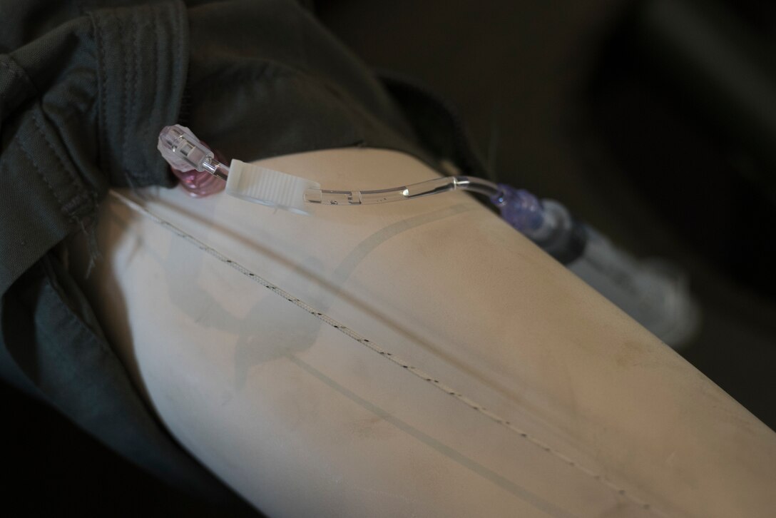 An intravenous therapy rests inside a simulated victim.
