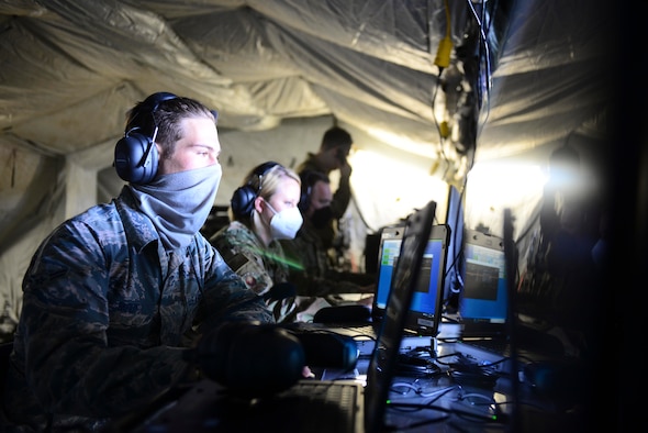 Members of the 606th Air Control Squadron operate the Theater Operationally Resilient Command and Control system during exercise Astral Knight 20 at Malbork Air Base, Poland, Sept. 22, 2020. Astral Knight 20 is a joint and multinational integrated air and missile defense exercise that involves Airmen and Soldiers from the United States and service members from the Estonian, Latvian, Lithuanian, Polish and Swedish armed forces. (U.S. Air Force photo by Tech. Sgt. Tory Cusimano)
