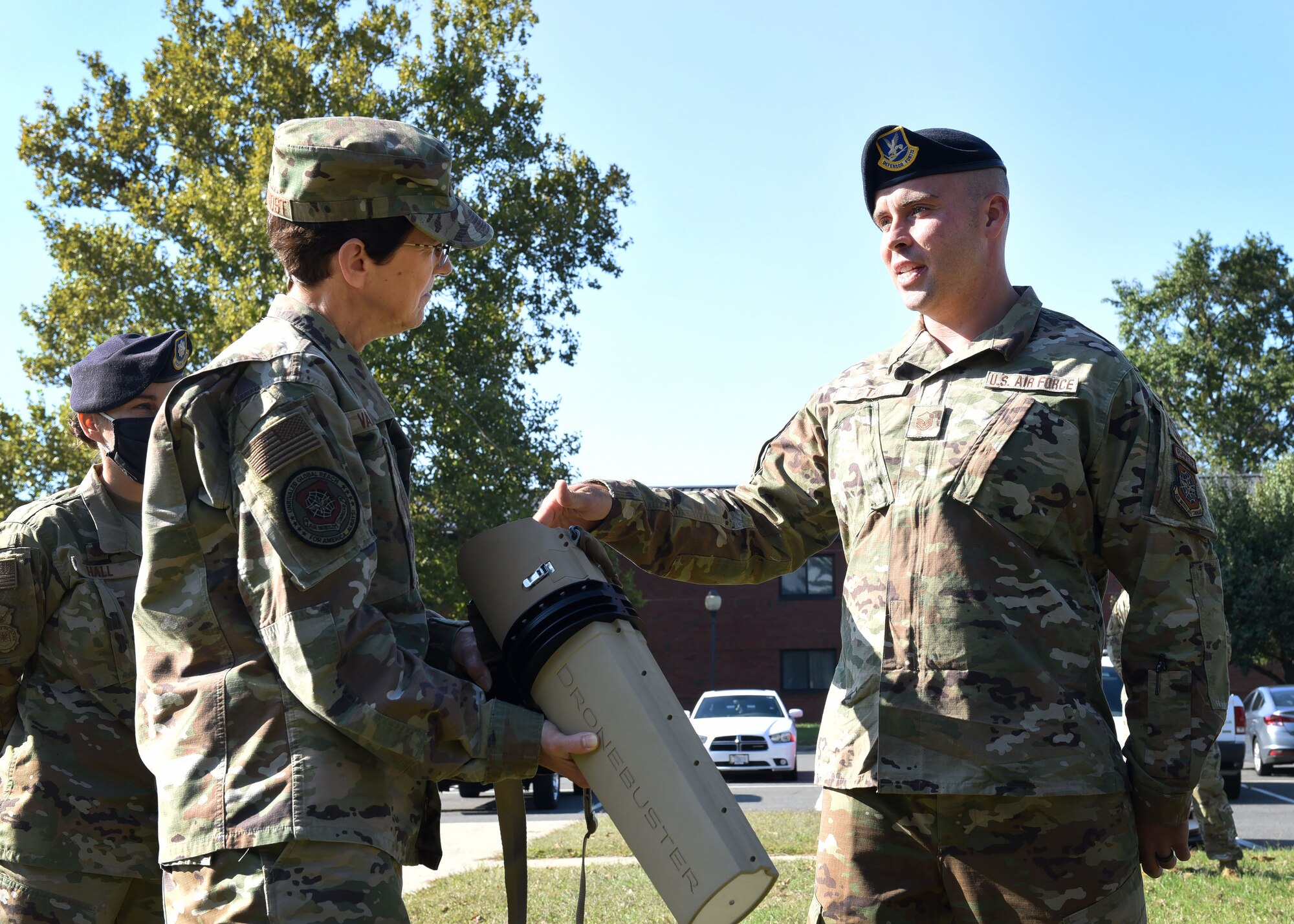 Photo of two individuals talking.