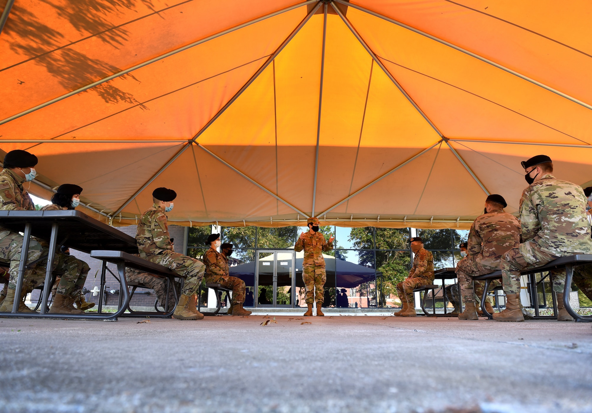 Photo of an individual speaking to Security Forces members.