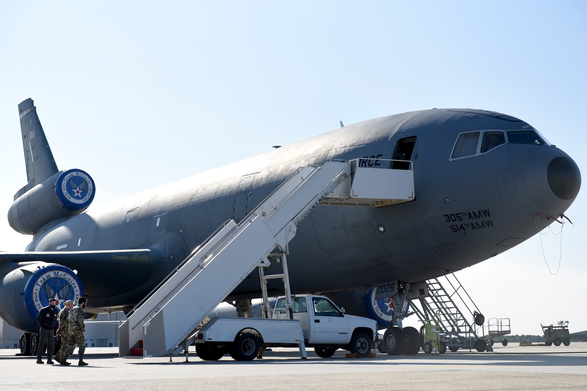 Photo of Airmen walking around a KC-10.