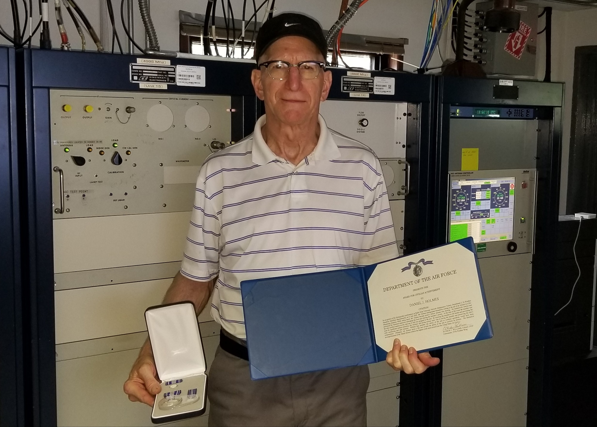 Daniel Holmes, 2d Weather Squadron Det. 2, located at the Sagamore Hill Solar Observatory in Hamilton, Massachusetts, was presented the Award for Civilian Achievement on Sept. 18, 2020 by Col. Patrick Williams, 557th Weather Wing commander, using a remote connection due to COVID-19 traveling restrictions.