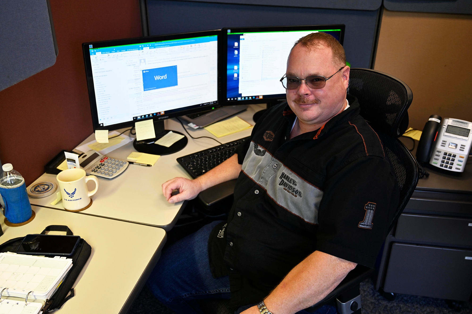 Stanley Gohl, Air Force Materiel Command Historian, researches how to best support the commander and the mission of AFMC at the AFMC Headquarters, Wright-Patterson Air Force Base, Ohio. (Air Force photo by Darrius Parker)