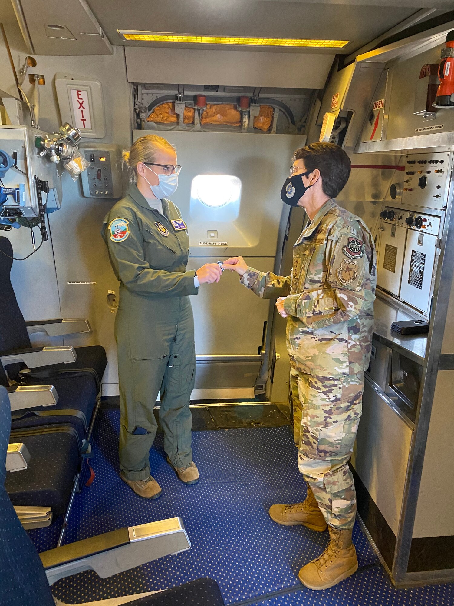 U.S. Air Force Gen. Jacqueline Van Ovost, Air Mobility Command commander visited the 514th Air Mobility Wing, Sept. 22.  Van Ovost coined two star performers during her visit, including Tech. Sgt Nicole Gansert, 78th Air Refueling Squadron and Staff Sgt. Krystin Springerince, 35th Aerial Port Squadron.