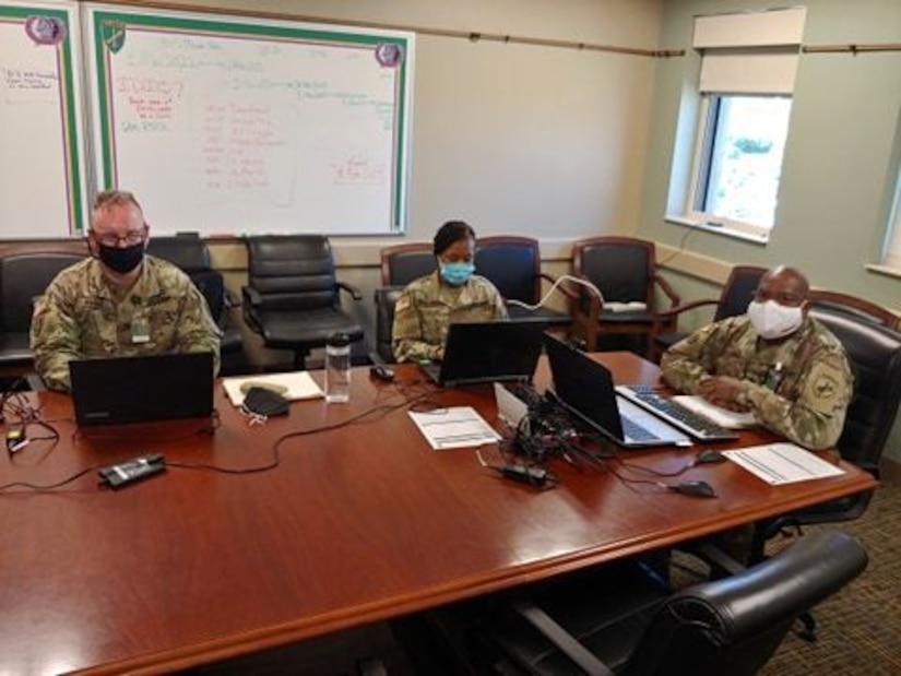 U.S. Army Reserve Sgt. 1st Class Shawn T. Kilgore (left), Staff Sgt. Monika L. Patterson (center), religious affairs specialists, and Lt. Col. Richard James, Sr., (right) command chaplain for the U.S. Army Civil Affairs & Psychological Operations Command, provide network support, coordination, and leadership during mandatory annual Unit Ministry Team (UMT) training for chaplains and religious affairs Soldiers for USACAPOC(A) and its subordinate commands during virtual annual training, Aug. 4 – 7, 2020. USACAPOC(A) ministry teams across the U.S. took part in the advanced UMT training, designed to prepare unit team members with the tools necessary to meet the challenges of working in today’s diffused ministry environment, and enable USACAPOC(A) UMT’s to meet new USARC ministry standards ahead of schedule. (U.S. Army Photo by Maj. Sean D. Delpech)