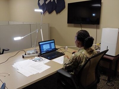 U.S. Army Reserve Staff Sgt. Monika Patterson, religious affairs specialist with the U.S. Army Civil Affairs & Psychological Operations Command, prepares to support mandatory annual Unit Ministry Team (UMT) training for chaplains and religious affairs Soldiers for USACAPOC(A) and its subordinate commands during virtual annual training, Aug. 4 – 7, 2020. USACAPOC(A) ministry teams across the U.S. took part in the advanced UMT training, designed to prepare unit team members with the tools necessary to meet the challenges of working in today’s diffused ministry environment, and enable USACAPOC(A) UMT’s to meet new USARC ministry standards ahead of schedule. (U.S. Army Photo by Maj. Sean D. Delpech)