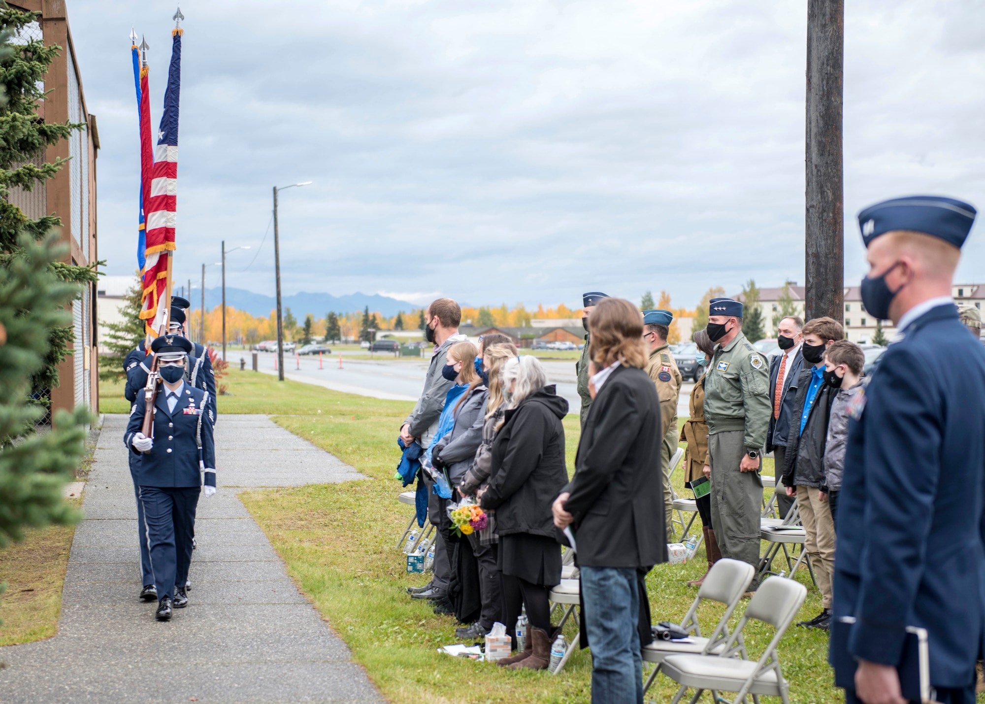 Surviving family members, distinguished guests and members of 962nd Airborne Air Control Squadron attend the Yukla 27 25th anniversary memorial ceremony at Joint Base Elmendorf-Richardson, Alaska, Sept. 22, 2020. Yukla 27, a U.S. Air Force E-3 Sentry airborne warning and control system aircraft assigned to the 962nd AACS, encountered a flock of geese Sept. 22, 1995, and crashed shortly after takeoff on a routine surveillance training sortie, killing all 24 Canadian and U.S. Airmen aboard.