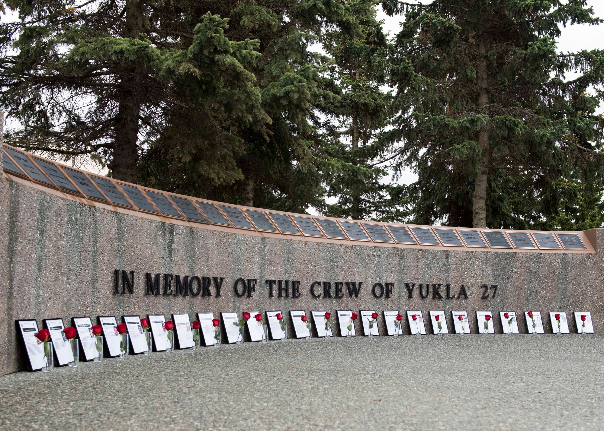Surviving family members, distinguished guests and members of 962nd Airborne Air Control Squadron attend the Yukla 27 25th anniversary memorial ceremony at Joint Base Elmendorf-Richardson, Alaska, Sept. 22, 2020. Yukla 27, a U.S. Air Force E-3 Sentry airborne warning and control system aircraft assigned to the 962nd AACS, encountered a flock of geese Sept. 22, 1995, and crashed shortly after takeoff on a routine surveillance training sortie, killing all 24 Canadian and U.S. Airmen aboard.