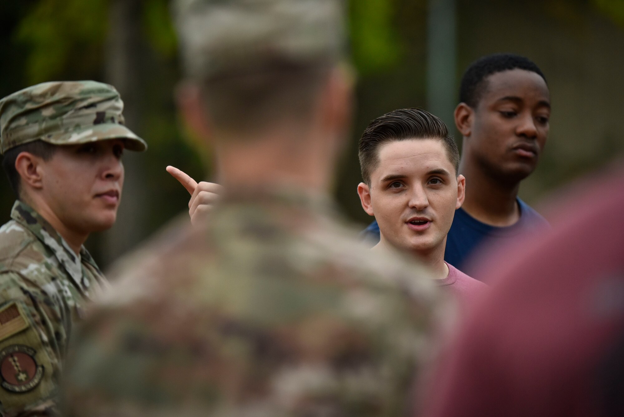 A photo of an Airman giving a speech.