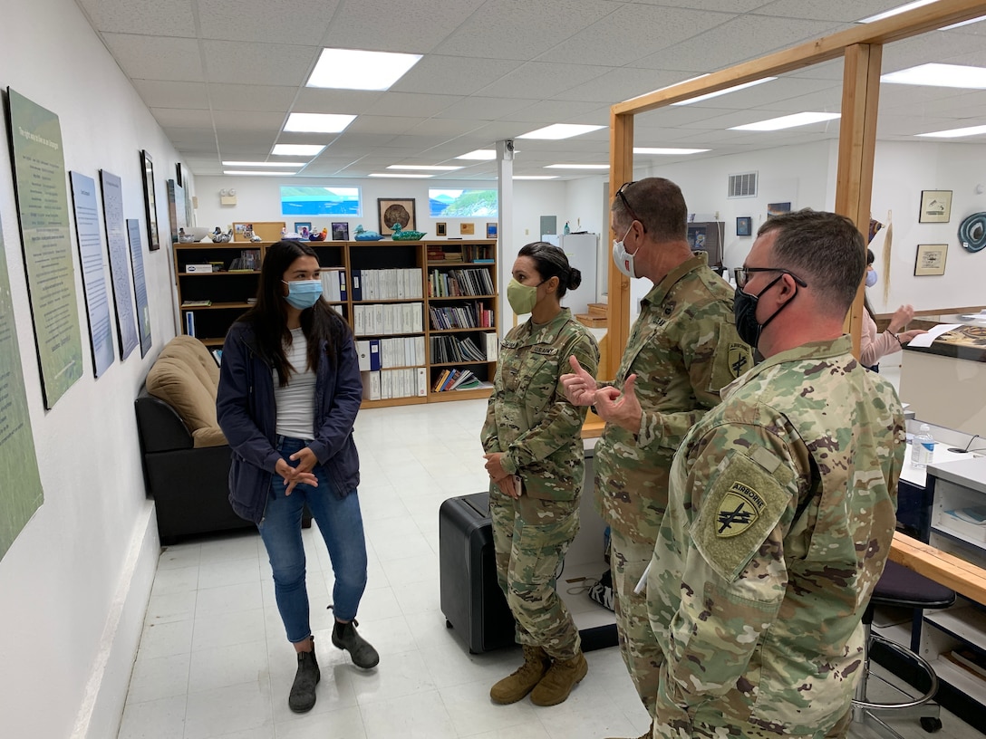 U.S. Army Reserve Maj. Tulsi Gabbard (2nd from left), Lt. Col. Hugh Dougalas (center), and Lt. Col. Eric Christeson (right), Governance team members from the 351st Civil Affairs Command Functional Specialty Team (FxSP) engage with a Qawalangin Tribe (Q-Tribe) Young Leader during the Innovative Readiness Training Civil-Military Partnership Subject Matter Expert Assessment, Aug. 25, 2020. IRT is a joint training concept that the Department of Defense (DOD) implemented to increase unit deployment readiness, leveraging the military contributions of U.S. Armed Forces capabilities, combined with local resources to build strong civil-military partnerships for communities in the contiguous United States and its territories.