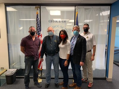 U.S. Army Reserve Col. Bradford “Brad” Hughes (far left), Maj. Tulsi Gabbard  (2nd from right), and Lt. Col. Hugh Dougals (far right), from the 351st Civil Affairs Command Functional Specialty Team (FxSP), pose with US Congressman (AK at-large district) Don Young (2nd from left), and Alaska State Senator Josh Revak (2nd from right) while conducting leader briefs during the Innovative Readiness Training Civil-Military Partnership Subject Matter Expert Assessment, Unalaska, Alaska, Aug. 29, 2020. IRT is a joint training concept that the Department of Defense (DOD) implemented to increase unit deployment readiness, leveraging the military contributions of U.S. Armed Forces capabilities, combined with local resources to build strong civil-military partnerships for communities in the contiguous United States and its territories.