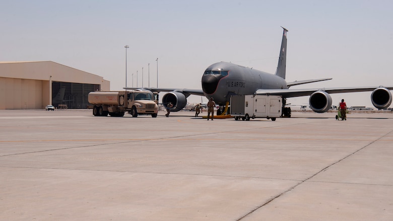 U.S. Air Force mobile distribution operators from the 379th Air Expeditionary Logistics Readiness Squadron participate in a KC-135 Stratotanker aircraft hot refueling training scenario at Al Udeid Air Base, Qatar, Sept. 21, 2020. This scenario exercises the ability to refuel a KC-135 with one or more engines running and directly advances mission agility in the U.S. Central Command’s area of responsibility.