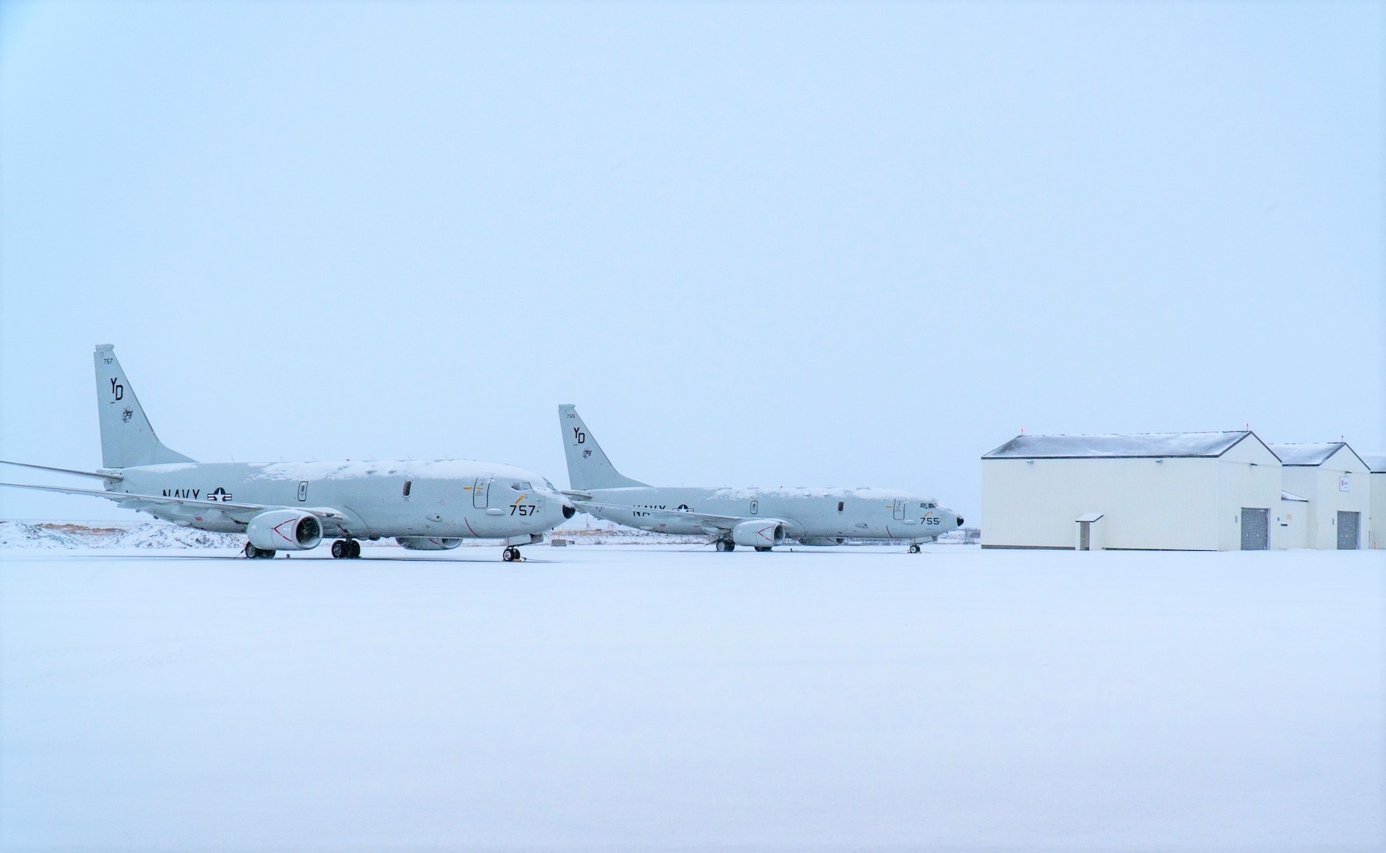 Two P-8A Poseidon maritime patrol and reconnaissance aircraft parked on the apron of Keflavik Air Base, Jan. 2, 2020.