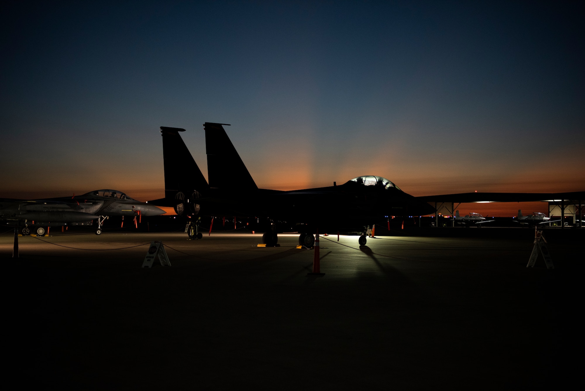 An F-15E Strike Eagle sits on the flightline at Laughlin Air Force Base, Texas, on Sept. 23, 2020. Two teams of pilots flying the F-15E visited Laughlin from Mountain Home Air Force Base, Idaho, to talk with student pilots, first assignment instructor pilots and leaders on the aircrafts’ capabilities as well as increase interaction within the fighter pilot community. (U.S. Air Force photo by Senior Airman Marco A. Gomez)