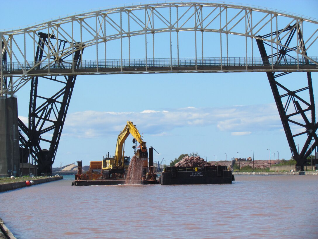 Trade West Construction continues the deepening of the Upstream Channel for the New Lock at the Soo in Sault Ste. Marie, Michigan. Deepening is the first phase of the new lock project and will be completed in the fall 2021.