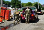 Joint Task Force members load food into civilian vehicles in Springfield, Ohio, Aug. 5, 2020. Since March members of the Ohio National Guard have been assisting at food banks across Ohio.