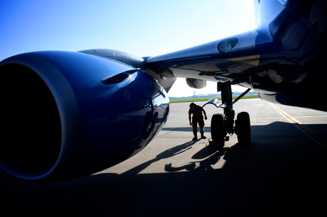 A 932nd Maintenance Group member performs a physical preflight inspection of C-40C aircraft tires August 26, 2020, Scott Air Force Base, Illinois. The 932nd Airlift Wing and 73rd Airlift Squadron continue training and mission operations during COVID-19. Pilots are required to maintain readiness and the 932nd MXG supports flight missions with preparation before take off, and then during recovery and post-checks after the flight. The 932nd Airlift Wing is the only Air Force Reserve Command unit that flies the C-40C.  (U.S. Air Force photo by Lt. Col. Stan Paregien)