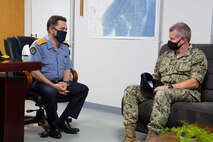 Vice Adm. Samuel Paparo, right, commander of U.S. Naval Forces Central Command, U.S. 5th Fleet and Combined Maritime Forces, speaks with Turkish Navy Rear Adm. Nejat Inanir, commander of Combined Task Force (CTF) 151, during a tour of CTF 151 facilities on board Naval Support Activity Bahrain, Sept. 23. CTF 151 conducts counter-piracy operates in two critical chokepoints in support of U.S. 5th Fleet area of operations and the free flow of global commerce.