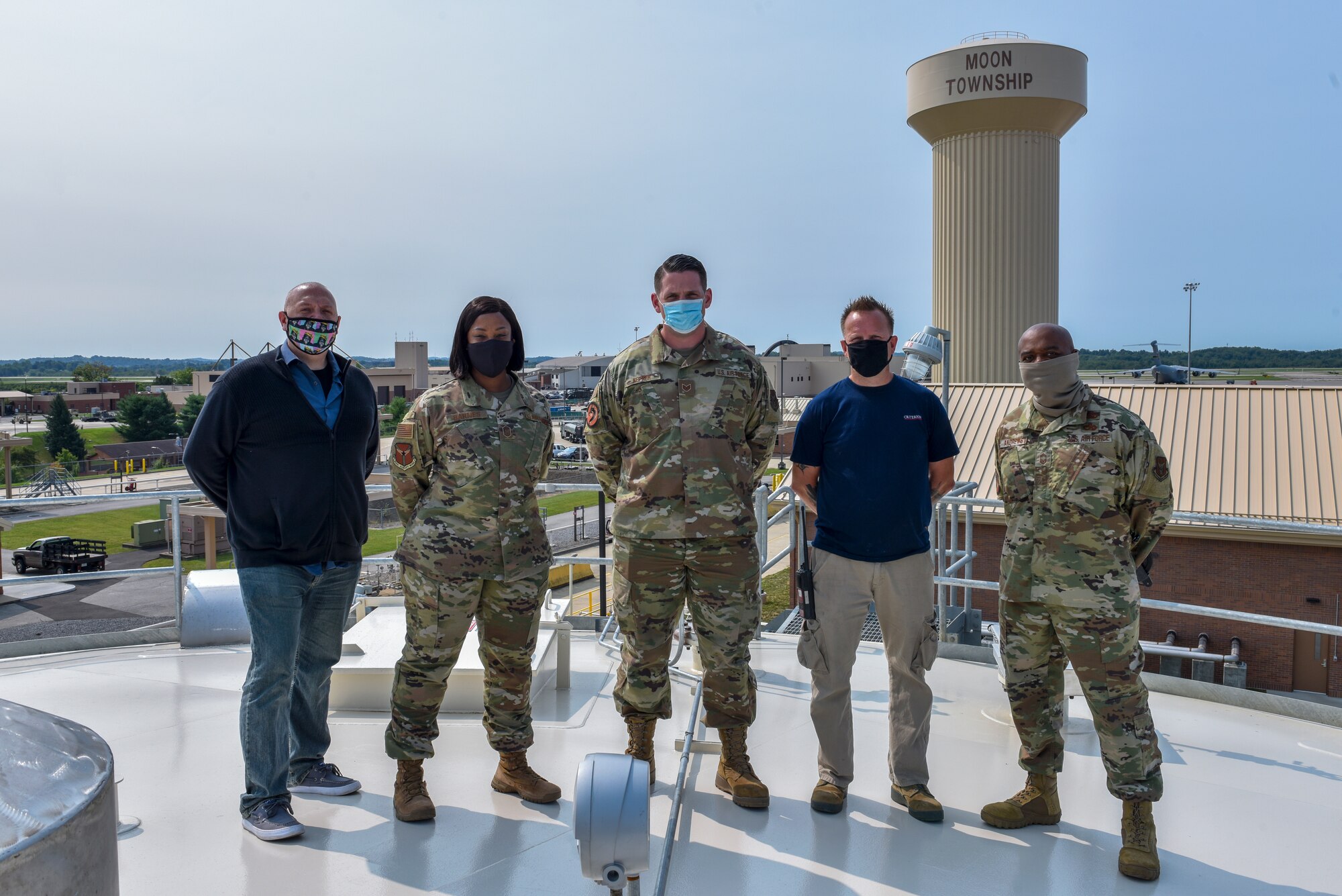 Chief Master Sgt. Jamesha Barnes, command chief of the 911th Airlift Wing, poses for a photo with members of the 911th Logistics Readiness Squadron at the Pittsburgh International Airport Air Reserve Station, Pennsylvania, Sept. 16, 2020.