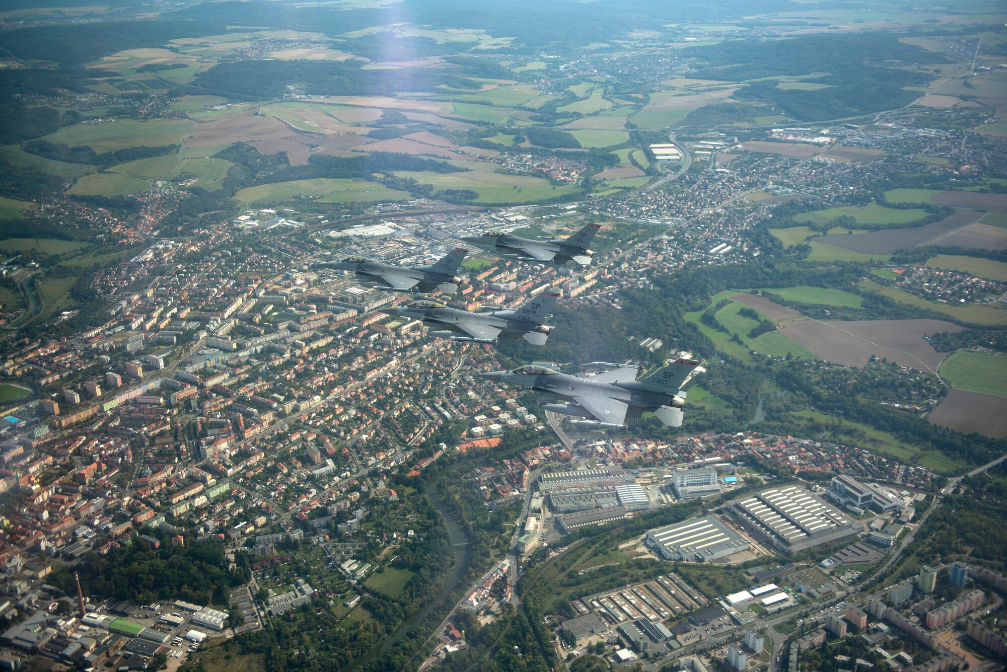 Four U.S. Air Force F-16 Fighting Falcons assigned to the 52nd Fighter Wing fly over the "Thank You America Memorial" at Pilsen, Czechia, Sept. 19, 2020. The memorial was erected in honor of the U.S. forces that liberated Pilsen in May 1945. (U.S. Air Force photo by Senior Airman Chanceler Nardone)