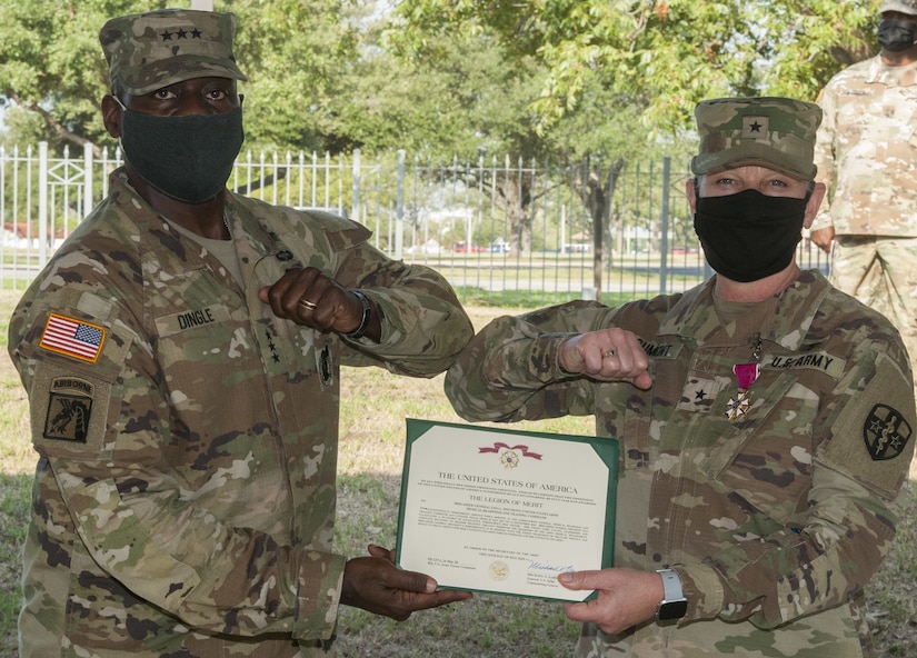 Brig. Gen. Lisa L. Doumont retires after 32 years of service.