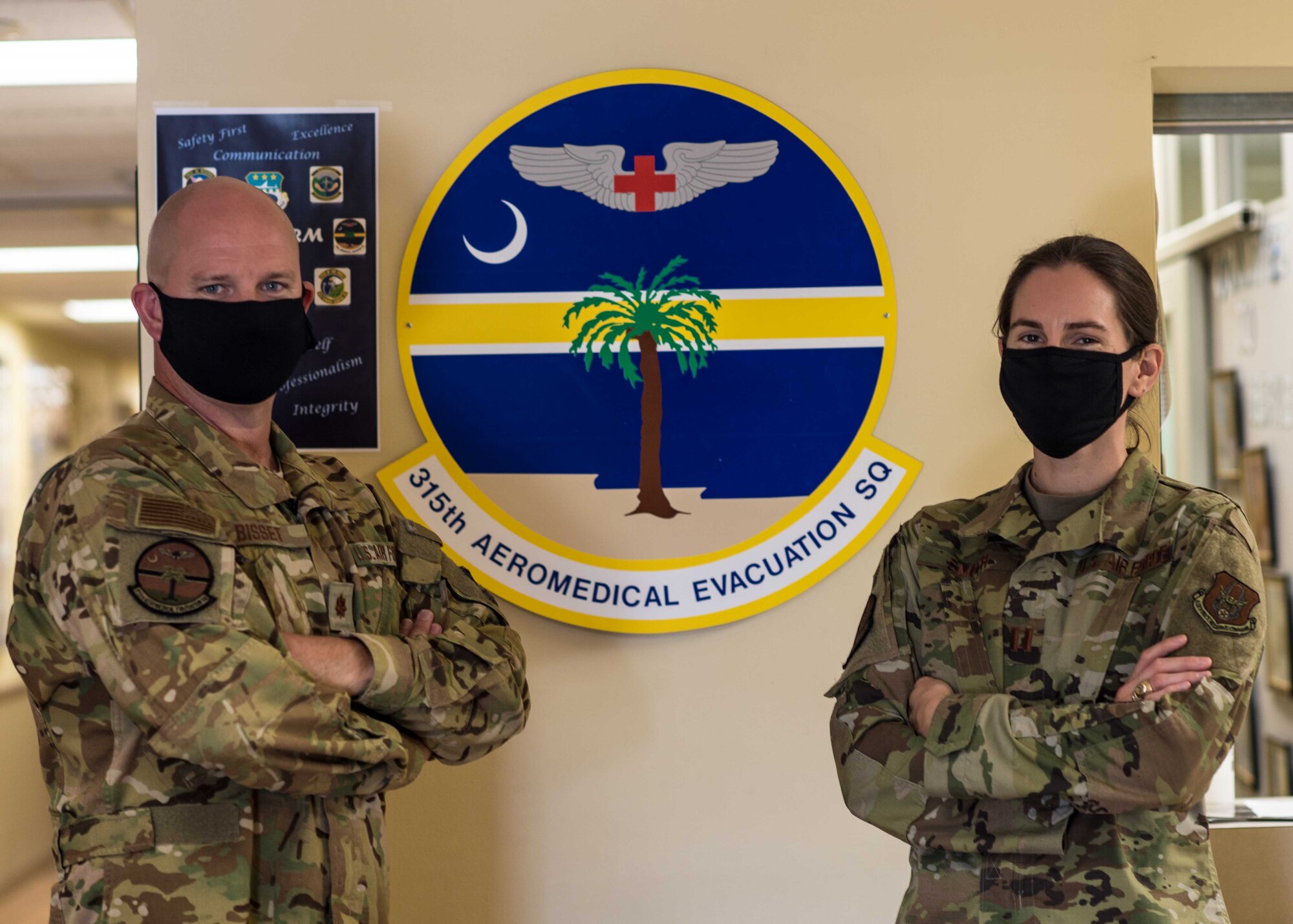 Major Andrew Bisset, flight nurse with the 315th Aeromedical Evacuation Squadron and Capt. Sarah Smith, medical service corp officer with the 315 AES, discuss their year of missions, March 2020 at Joint Base Charleston, S.C. The two reservist won Outstanding AFRC AE Aircrew Member of the Year and Outstanding AFRC AE Operations Member of the Year.