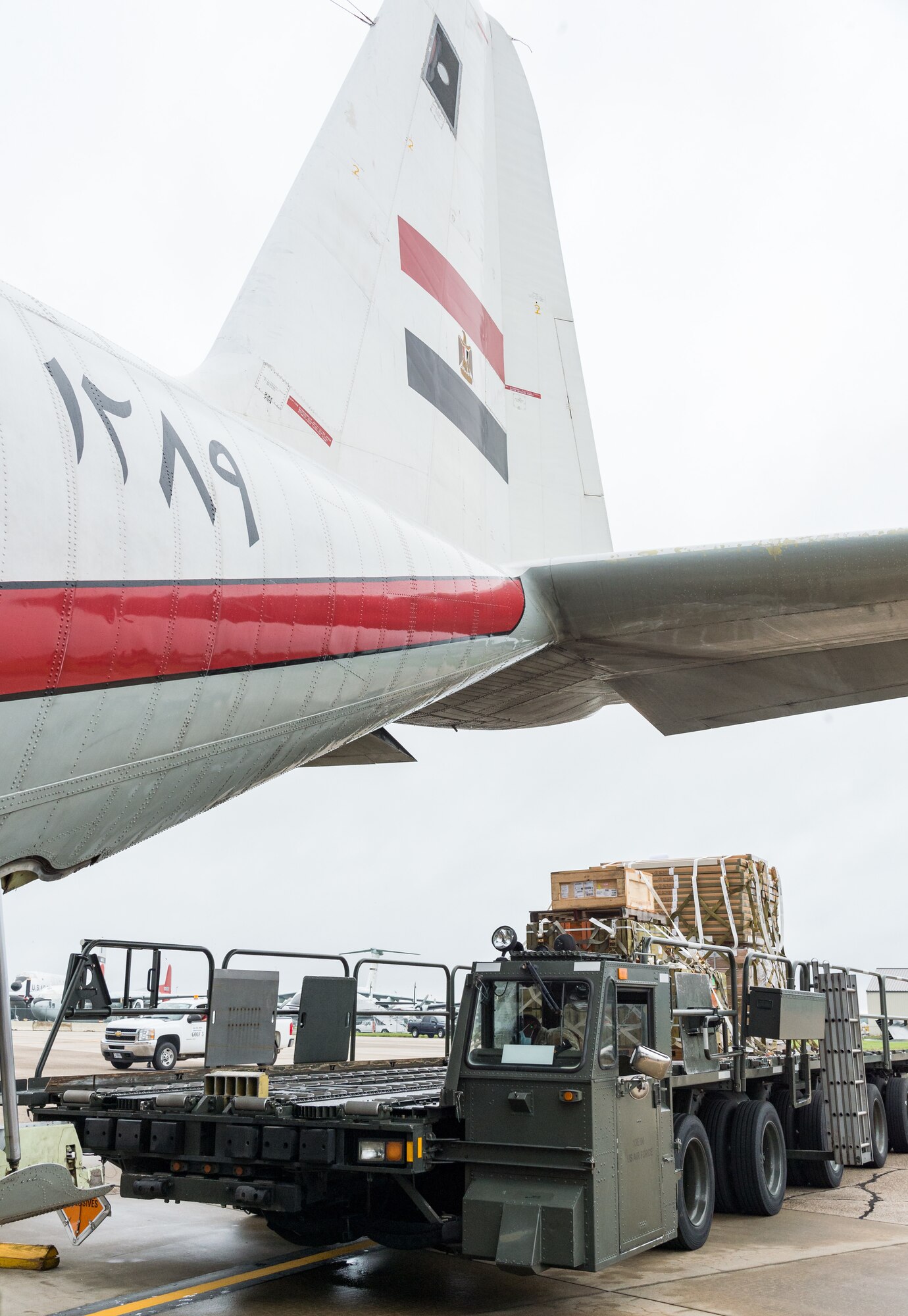 Airmen from the 436th Aerial Port Squadron load cargo onto an Egyptian air force C-130H Hercules Sept. 11, 2020, at Dover Air Force Base, Delaware, as part of a foreign military sales project. The strategic and historic partnership between Egypt and the United States plays a leading role in counterterrorism and regional security throughout the U.S. Central Command area of responsibility. Due to its strategic location, Dover AFB regularly supports foreign military sales operations. (U.S. Air Force photo by Roland Balik)