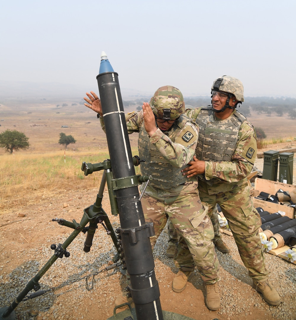 Soldiers of 1st Battalion, 65th Infantry Regiment, conduct mortar live-fire training on Aug. 20, 2020, at Camp Roberts, California. The 1-65th attended annual training with the 79th Infantry Brigade Combat Team for the first time from Aug. 13- 28, 2020, since becoming aligned under the brigade in 2018.