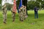 Members of a Wisconsin National Guard color guard with Battery C, 1st Battalion, 120th Field Artillery, salute during a headstone dedication ceremony for Staff Sgt. Walter A. Schaller Sept. 10, 2020, at Holy Cross Cemetery in Milwaukee. Schaller joined the Wisconsin Army National Guard's 32nd Division on April 29, 1941, and was killed in New Guinea on Feb. 20, 1944. He was buried in an unmarked grave at the cemetery in 1949 until a local historian discovered it through research.