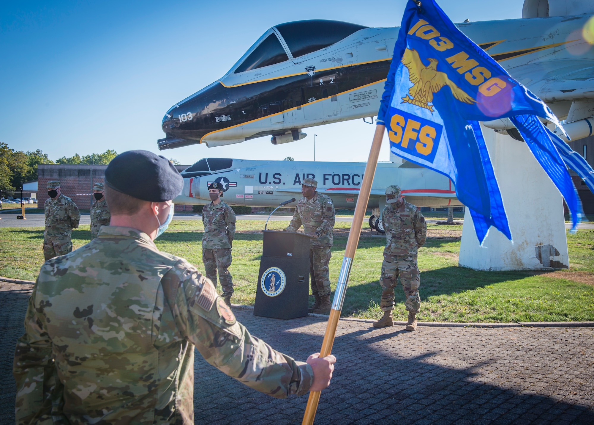 Senior Airman Alexis Maher (left of podium) receives the 103rd Airlift Wing First Sergeant Council’s 2019 Diamond Award. Airmen through the rank of Technical Sergeant are eligible for nomination, and candidates appear before a board for evaluation. (U.S. Air National Guard photo by Staff Sgt. Steven Tucker)