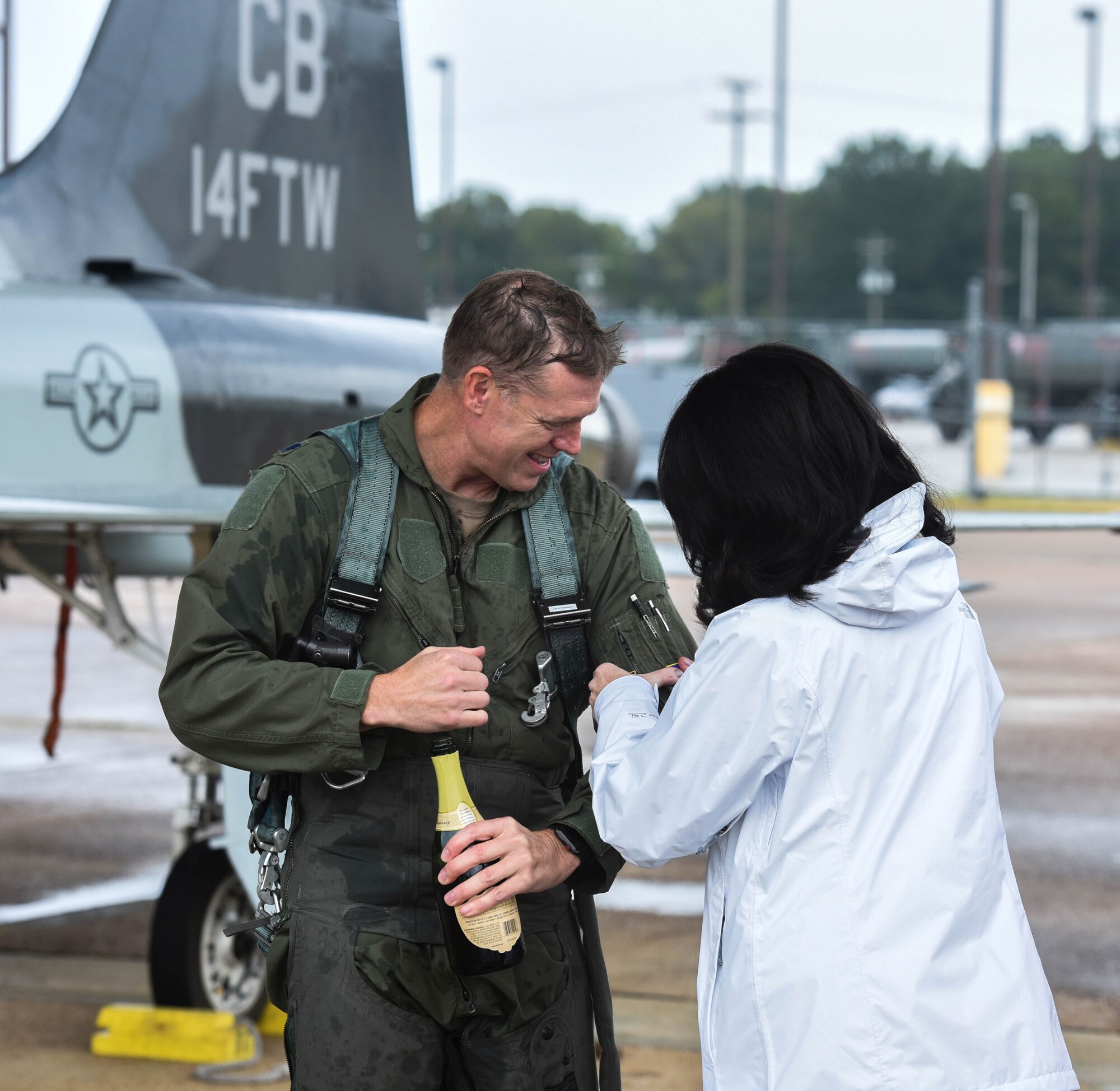 U.S. Air Force Lt. Col. David Easterling Jr., 43rd Flying Training Squadron instructor pilot, celebrates with family after completing 4,000 flight hours in the T-38 Talon on September 23, 2020, at Columbus Air Force Base, Miss. As the T-38 fleet has aged since 1959, specific airframe, engine and system components have been modified or replaced. (U.S. Air Force photo by Airman 1st Class Davis Donaldson)