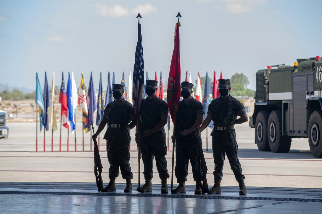 Lt. Col Robert G. Reinoehl assumes command of Headquarters and Headquarters Squadron (H&HS) during a change of command ceremony at the search and rescue (SAR) hanger aboard Marine Corps Air Station (MCAS) Yuma on July 21, 2020.