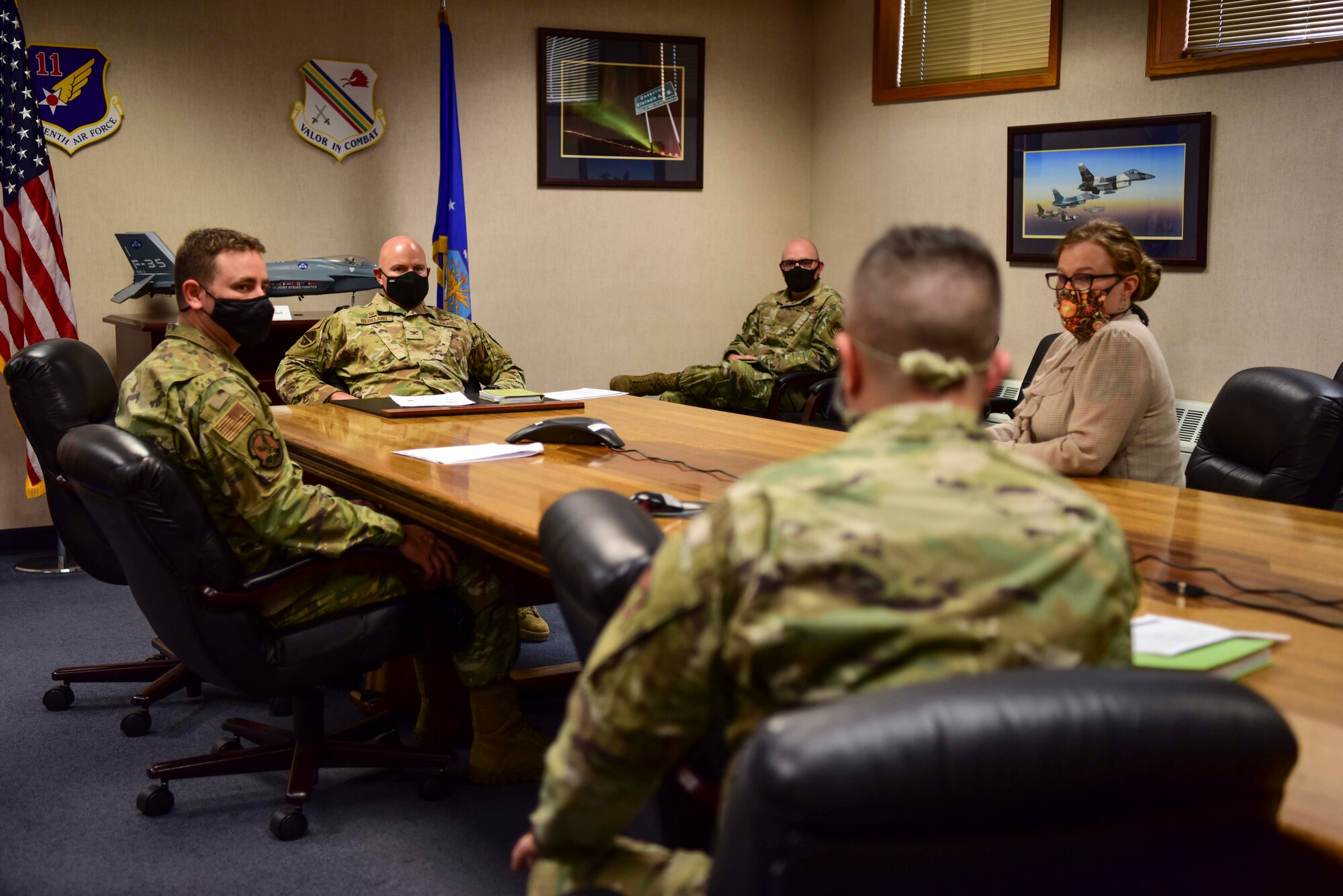 U.S. Air Force Col. David Berkland, the 354th Fighter Wing commander, and Chief Master Sgt. Michael Zeigler, the 354th Logistics Readiness Squadron vehicle management flight chief, meet with the 354th Comptroller Squadron (CPTS) leaders during a wing leadership immersion at Eielson Air Force Base, Alaska, Sept. 22, 2020.