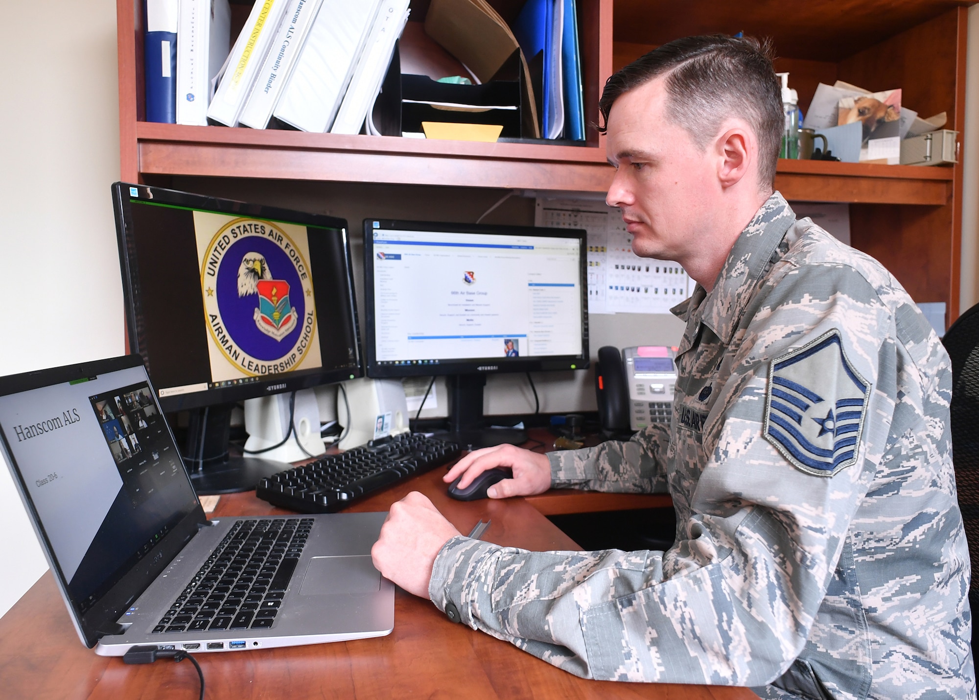 Master Sgt. Brandon McCarty, Airman Leadership School commandant, participates in a virtual graduation ceremony for ALS class 20G held on Zoom