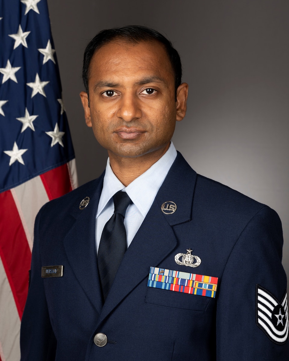 Official photo of TSgt Ryan Persaud, Bassist, USAF Heritage of America Band, Joint Base Langley-Eustis.