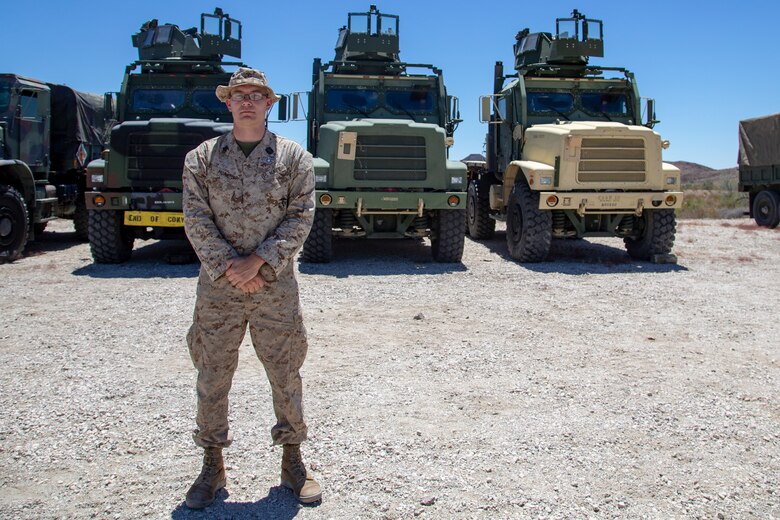 U.S. Navy Hospital Corpsmen (HM) 3 Ayite Akypokli and HM2 Courtland Morris, field medical service technicians, attached to Marine Air Control (MACS) 1 receive their Enlisted Fleet Marine Force (FMF) Warfare Specialist Insignia award at Yuma Proving Grounds (YPG) aboard Marine Corps Air Station Yuma, Aug. 6, 2020. The FMF award is given to Navy enlisted personnel who are attached to deployable U.S. Marine Corps units and pass verbal and written exams qualifying them in Marine Corps history, and knowledge. (U.S. Marine Corps photo by LCpl. Gabrielle Sanders)