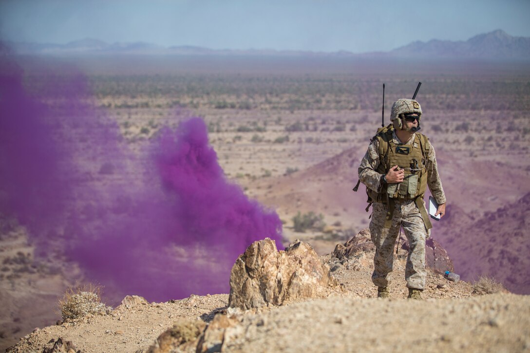 U.S. Marine Corps Maj. Eric Nilsson, an air officer with Marine Aviation Weapons and Tactics Squadron (MAWTS) 1 oversees a live ordnance observation training as the Range Safety Officer in Yuma, Ariz., Aug. 28, 2020.