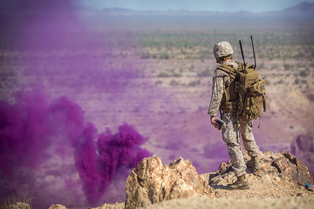 U.S. Marine Corps Maj. Eric Nilsson, an air officer with Marine Aviation Weapons and Tactics Squadron (MAWTS) 1 oversees a live ordnance observation training as the Range Safety Officer in Yuma, Ariz., Aug. 28, 2020.