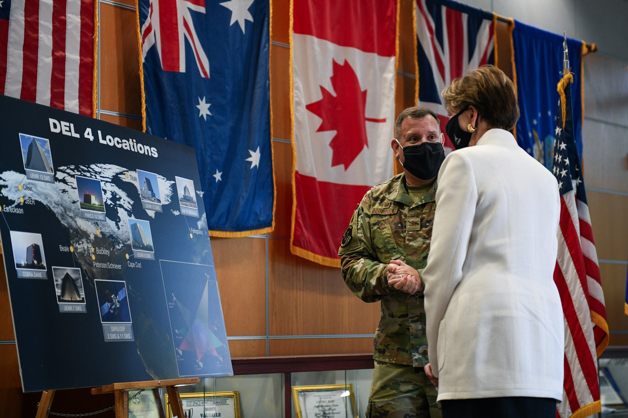 Col. Richard Bourquin, Space Delta 4 commander, gives a mission brief to Secretary of the Air Force Barbara Barrett, on Sept. 23, 2020, at DEL 4’s Mission Control Station on Buckley Air Force Base, Colo.