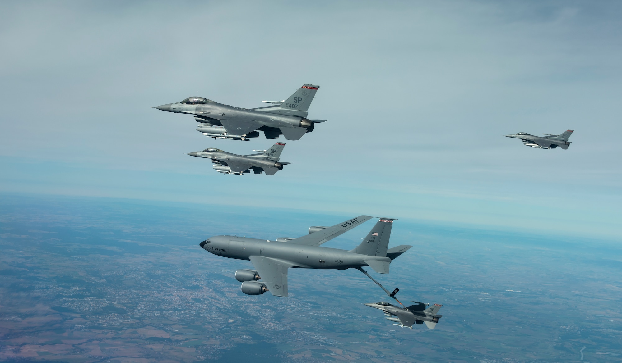 One U.S. KC-135 assigned to the 155th Air Refueling Wing, provides additional fuel to four U.S. Air Force Fighting Falcons assigned to the 52nd Fighter Wing, near Ostrava, Czechia Sept. 19, 2020. These aircraft later flew over the "NATO Days 2020" airshow in Ostrava, followed by Prague and Pilsen, Czechia. (U.S. Air Force photo by Senior Airman Chanceler Nardone)