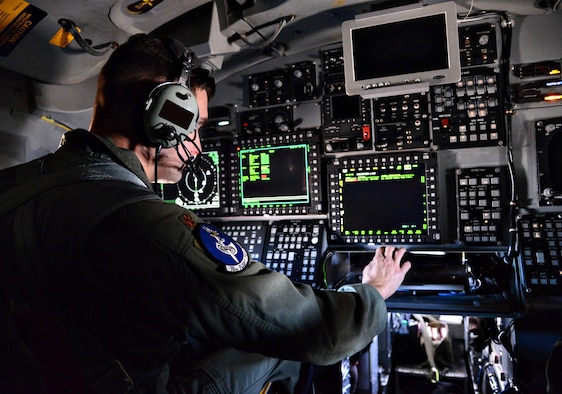 Airman sitting at station aboard B-1