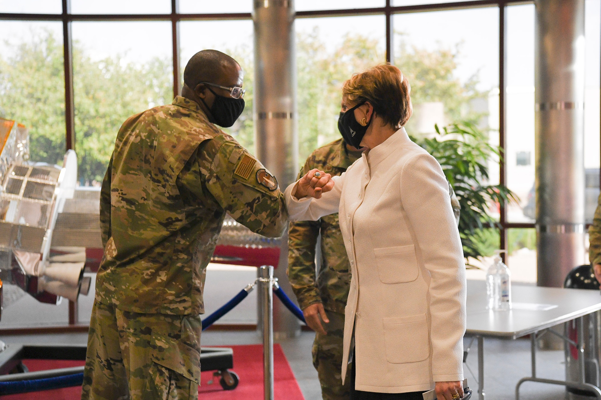 Chief Master Sgt. Willie Frazier II, Space Delta 4 senior enlisted leader, greets Secretary of the Air Force Barbara Barrett, Sept. 23, 2020 at DEL 4’s Mission Control Station on Buckley Air Force Base, Colo.